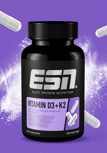 ESN Vitamin D3+K2 Nahrungsergänzungsmittel in einer schwarzen Dose mit violettem Hintergrund und Kapseln im Design.